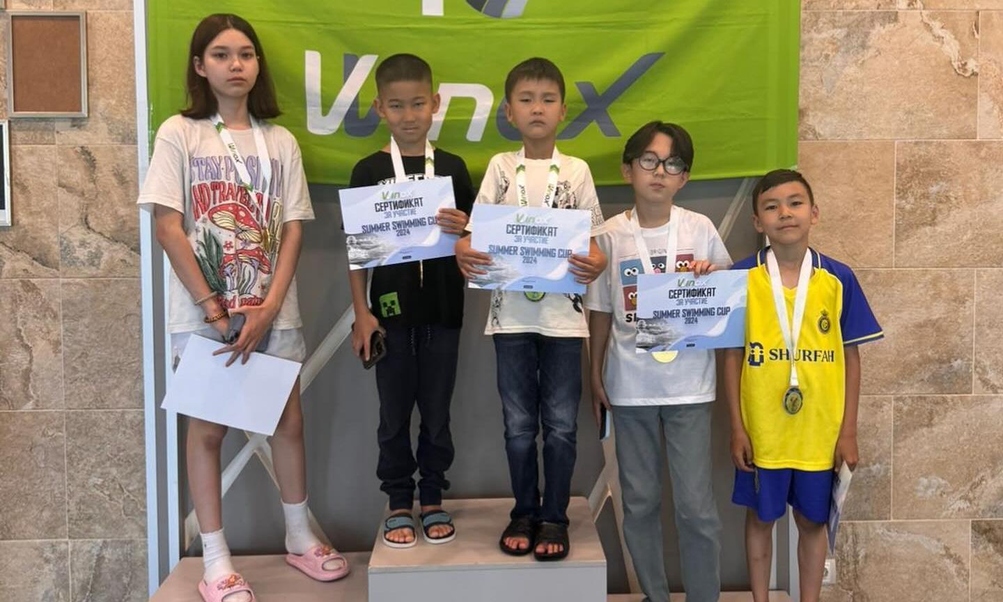 Жақсылық Үшкемпіров атындағы Жекпе-жек сарайының жас спортшылары жүзуден балалар арасында өткен  «Summer Swimming Cup» турниріне қатысты